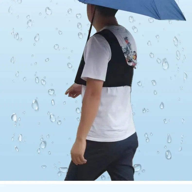 Black diving cloth umbrella holder with shoulder strap shown holding a manual umbrella