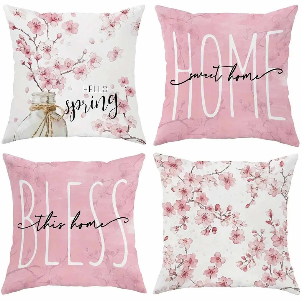 45cm square cherry blossom print cushion cover in short velvet fabric on a grey sofa.