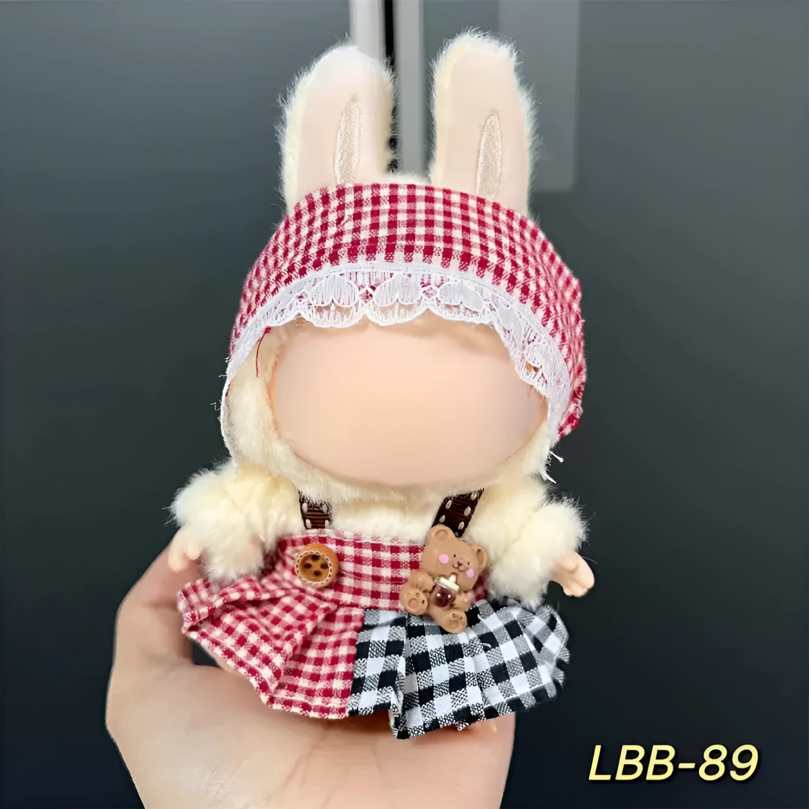 Plastic doll costume for a 17cm tall vinyl fashion figurine on a white background.