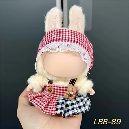 Plastic doll costume for a 17cm tall vinyl fashion figurine on a white background.