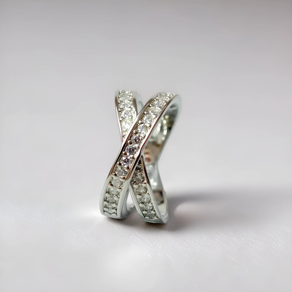 Silver or rose gold metal ring featuring a cross design with micro-inlaid zircon stones.
