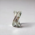 Silver or rose gold metal ring featuring a cross design with micro-inlaid zircon stones.