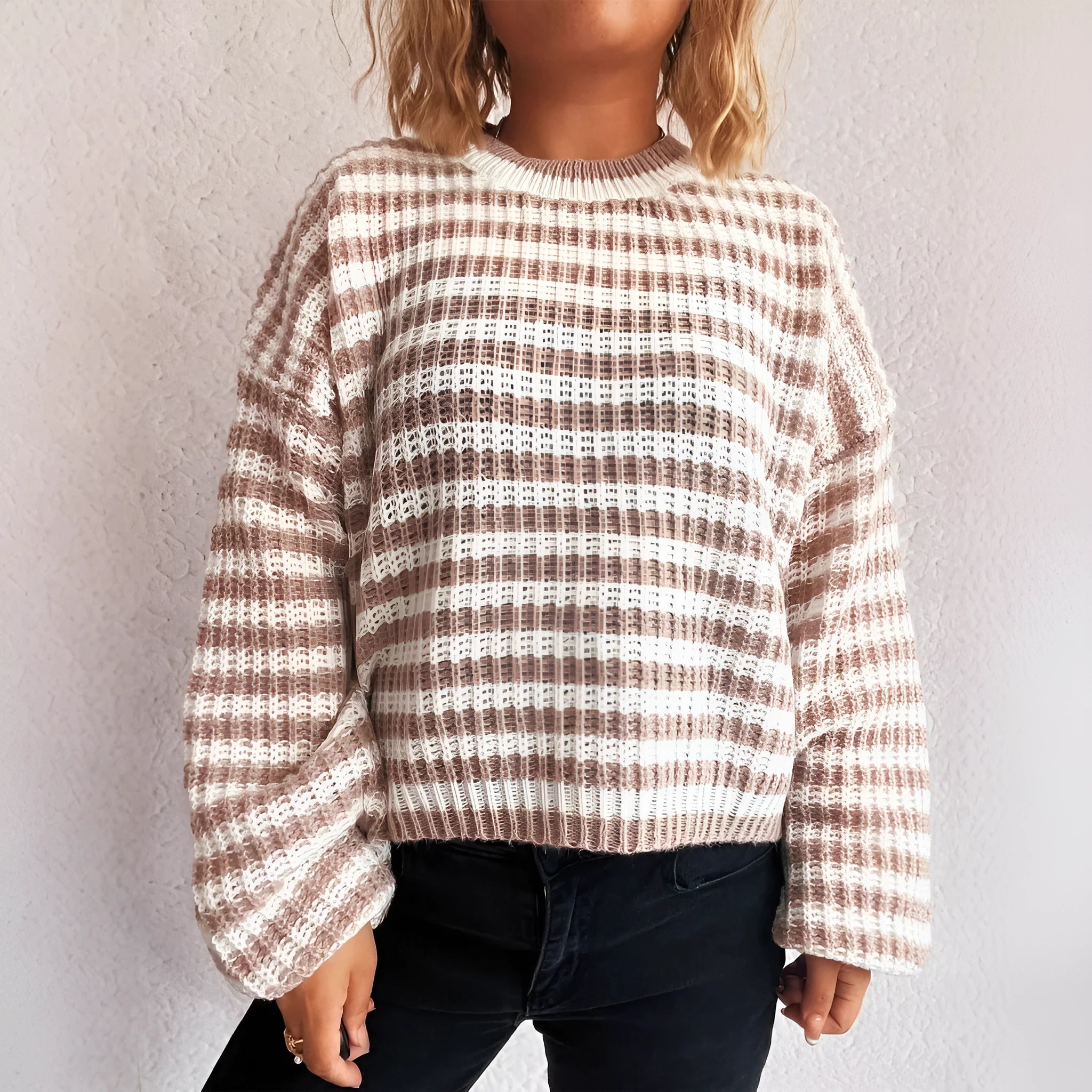 Women's vintage stripe knitted loose-fit pullover sweater in polyester, shown in a selection of colours.