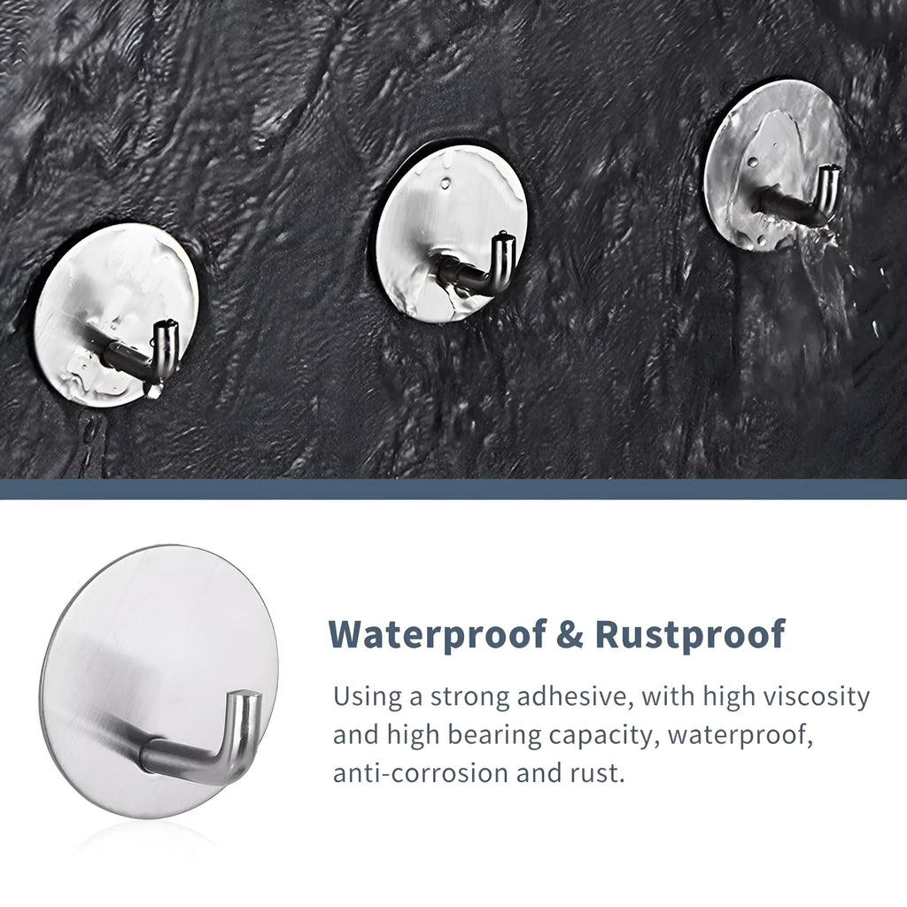 Two stainless steel self-adhesive hooks on a surface, one black and one polished.