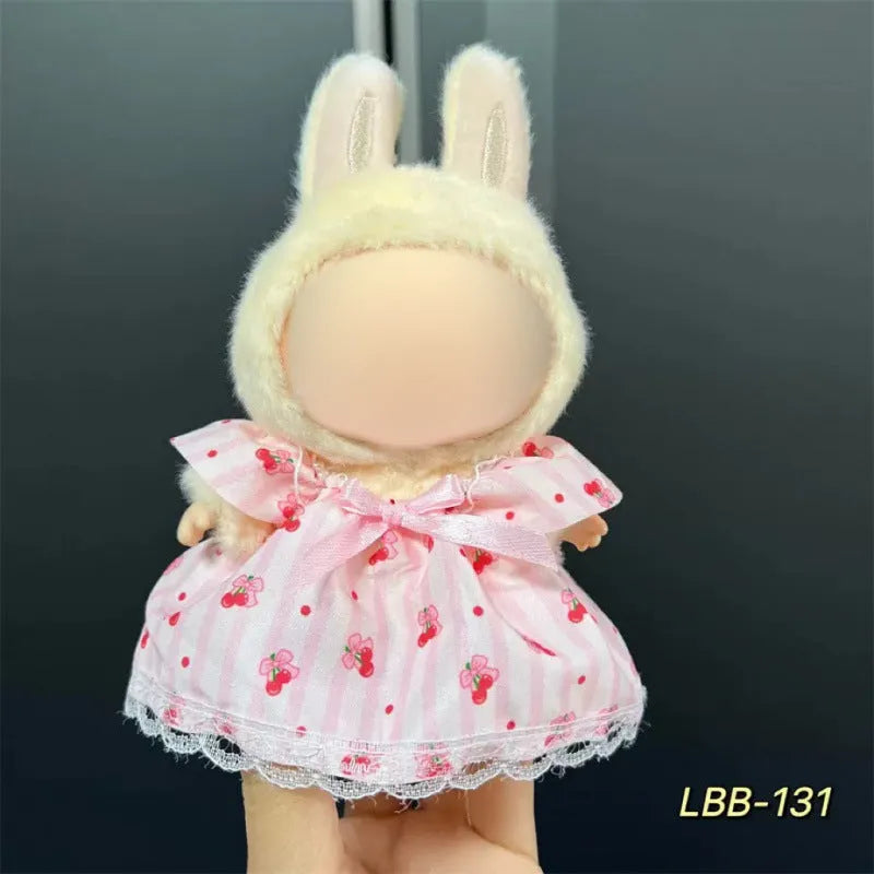 Plastic doll costume for a 17cm tall vinyl fashion figurine on a white background.