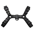Black leather chest strap with metal buckle and rivets laid flat