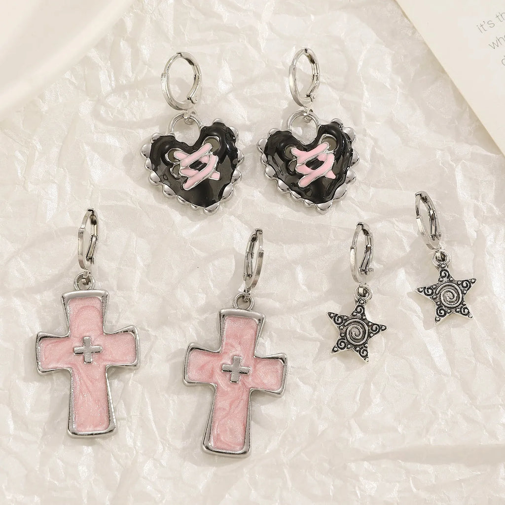 Women's alloy cross crystal earrings in white, bright black, and antique silver colours with geometric animal designs