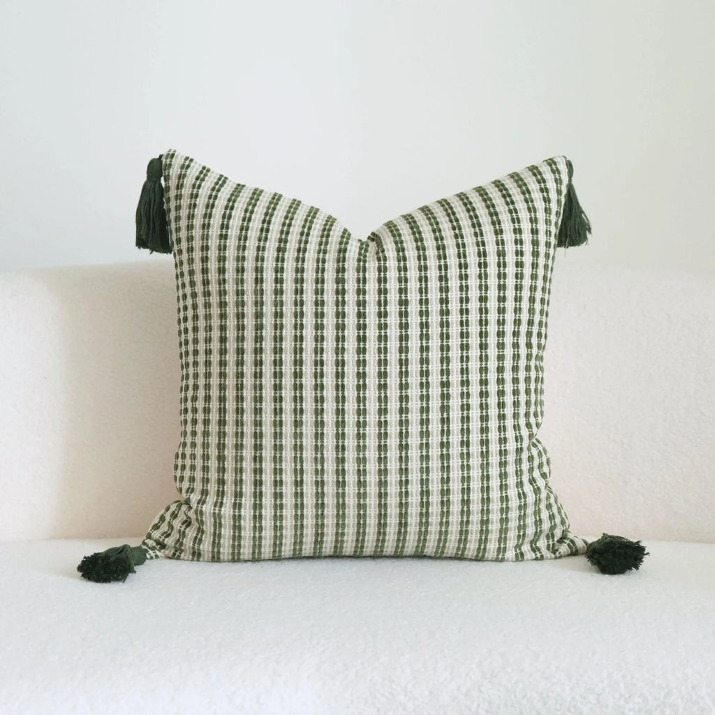 Green cotton linen hotel sample pillow with tassel detail in striped or leaf patterns