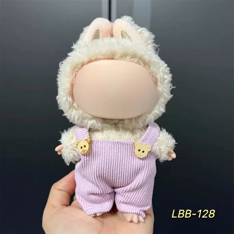 Plastic doll costume for a 17cm tall vinyl fashion figurine on a white background.