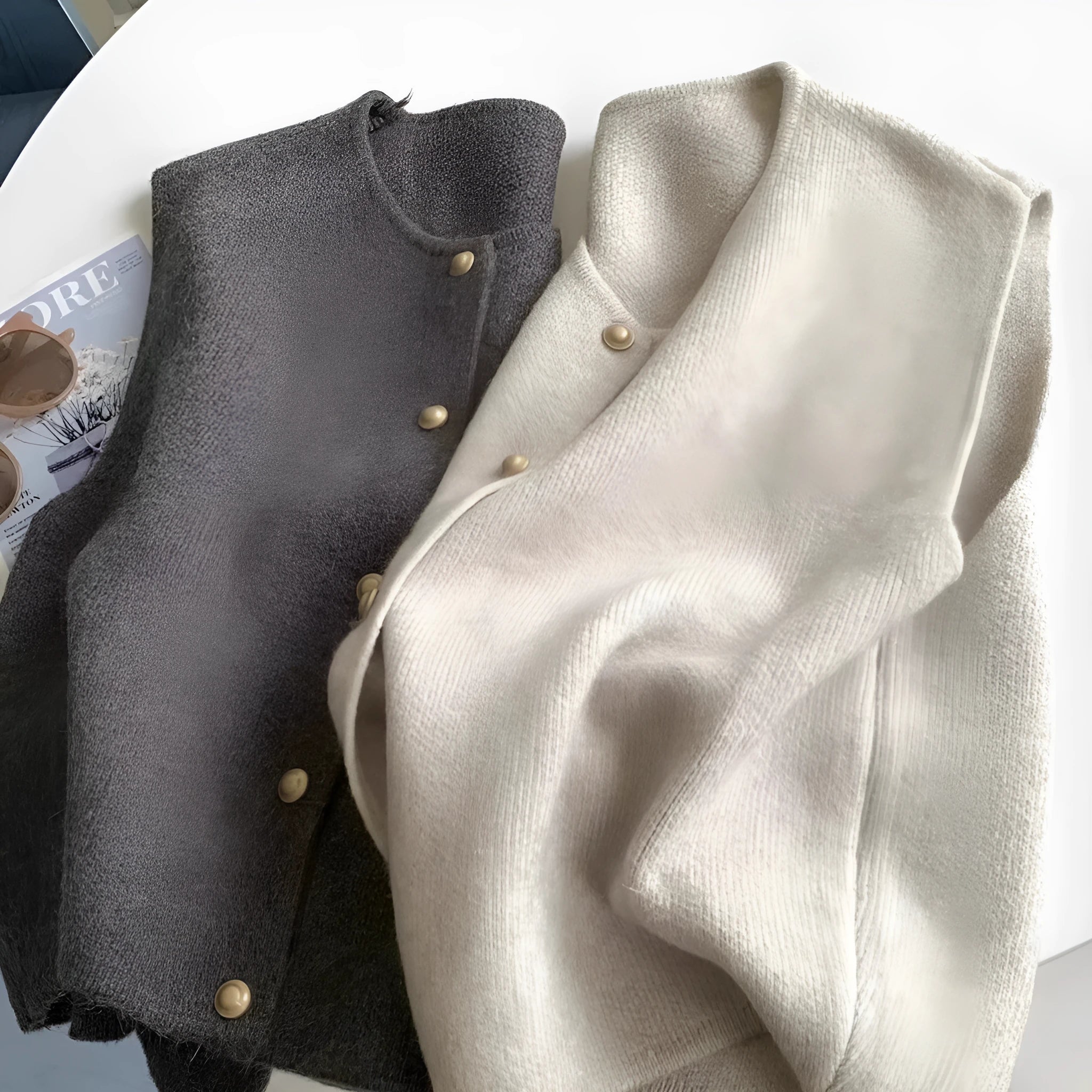Women's grey V-neck polyester pullover vest with half-length sleeves laid flat