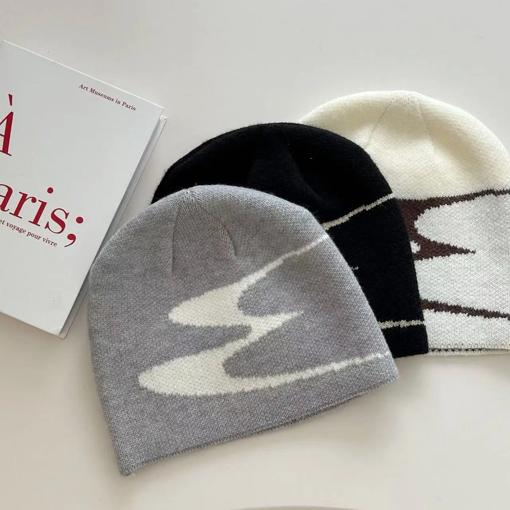 Unisex acrylic beanie hat in black, grey or white for autumn and winter wear