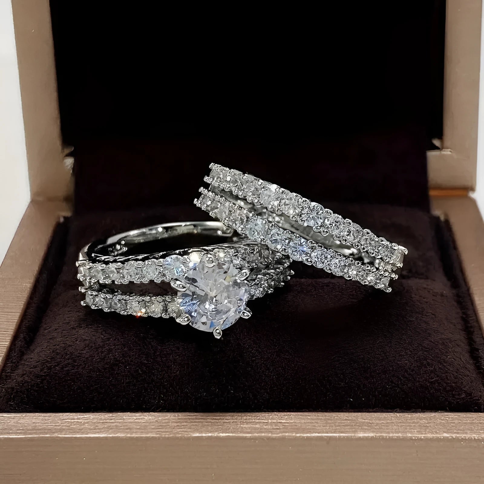 Women's 2-in-1 fully jewelled ring set in geometric design with round elements, shown in gold, rose gold, and silver finishes