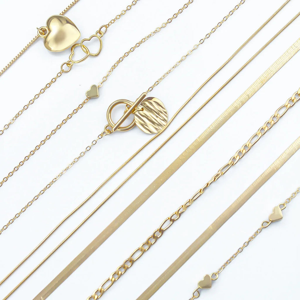 10 piece gold necklace set with snake bone chain and alloy pendants