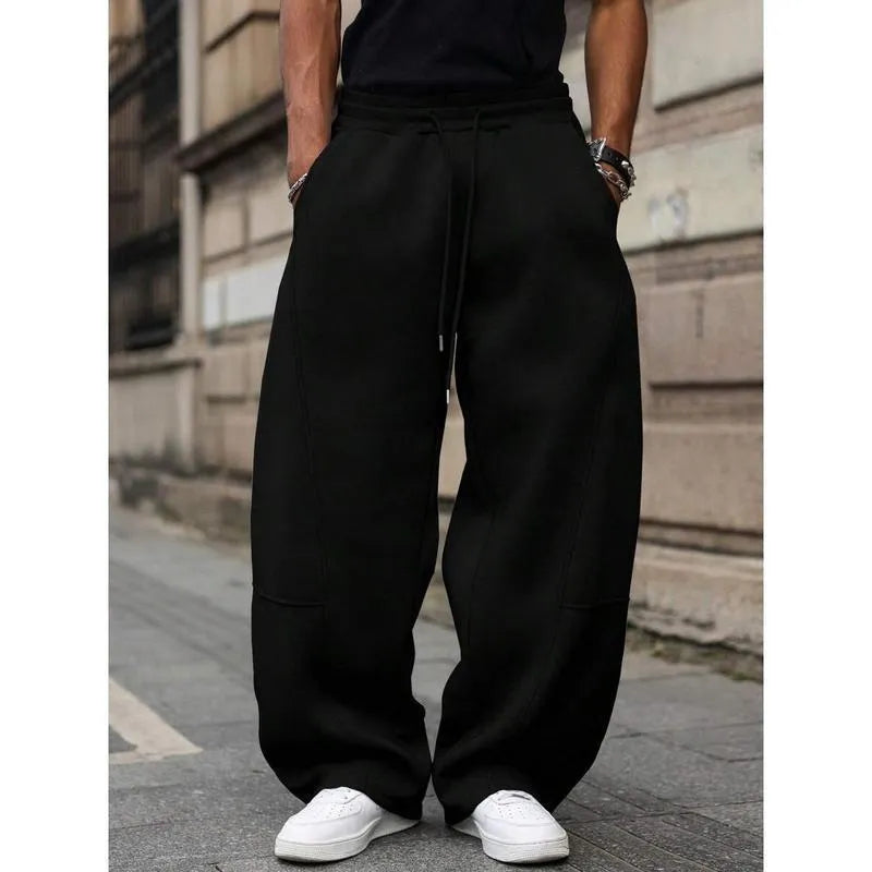 Men's straight-leg high waist casual trousers in a cropped length, shown in a dark grey colour.
