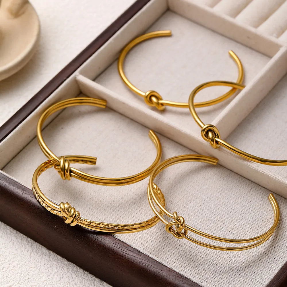 Adjustable stainless steel bracelet with knotted double-layer design in gold plating