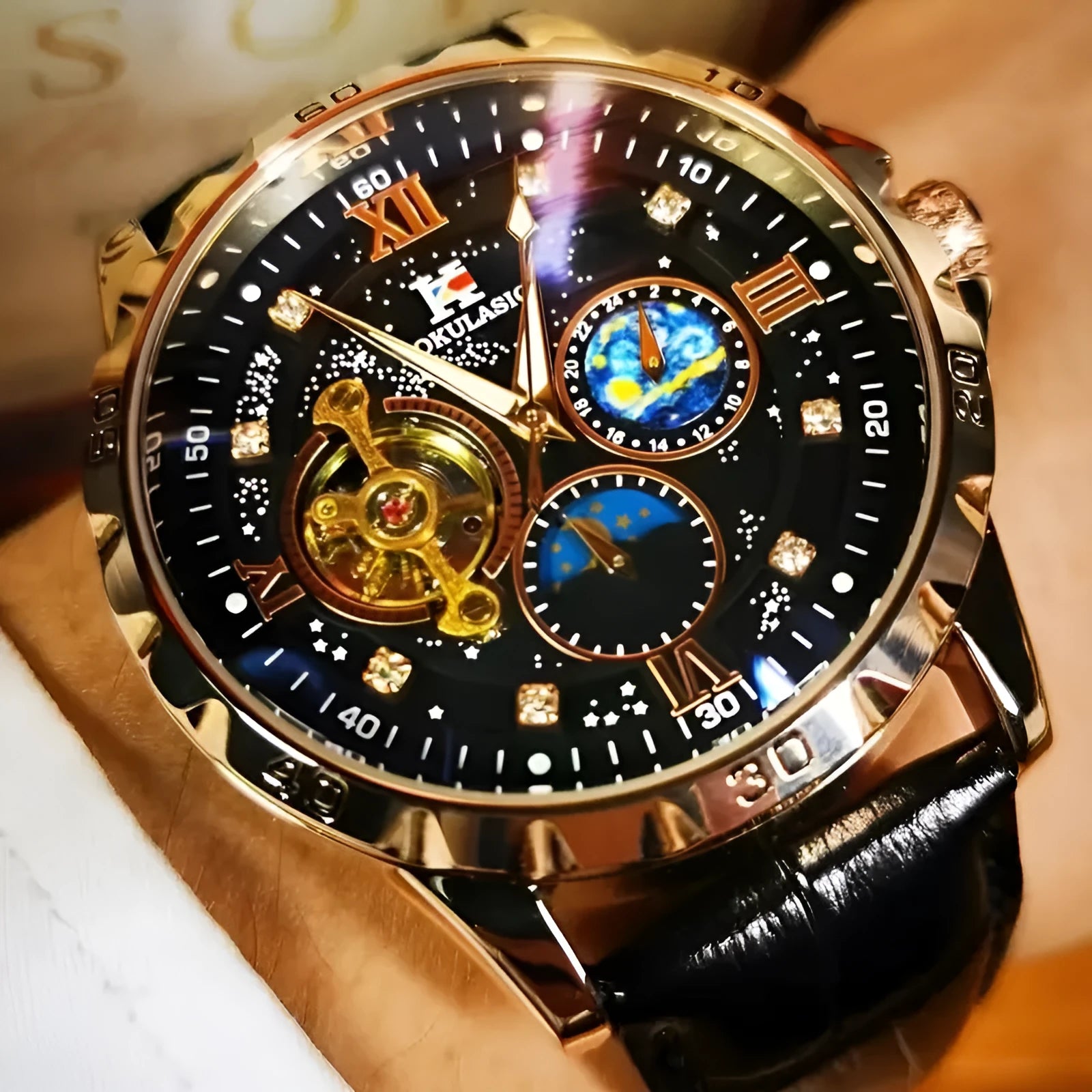 Black automatic mechanical watch with rose gold shell and hollow dial showing movement
