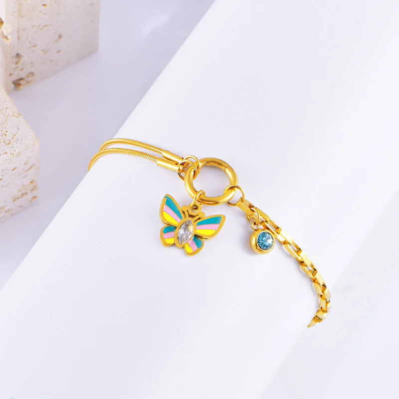 Gold butterfly jewellery set with titanium steel necklace and bracelet featuring animal zodiac design