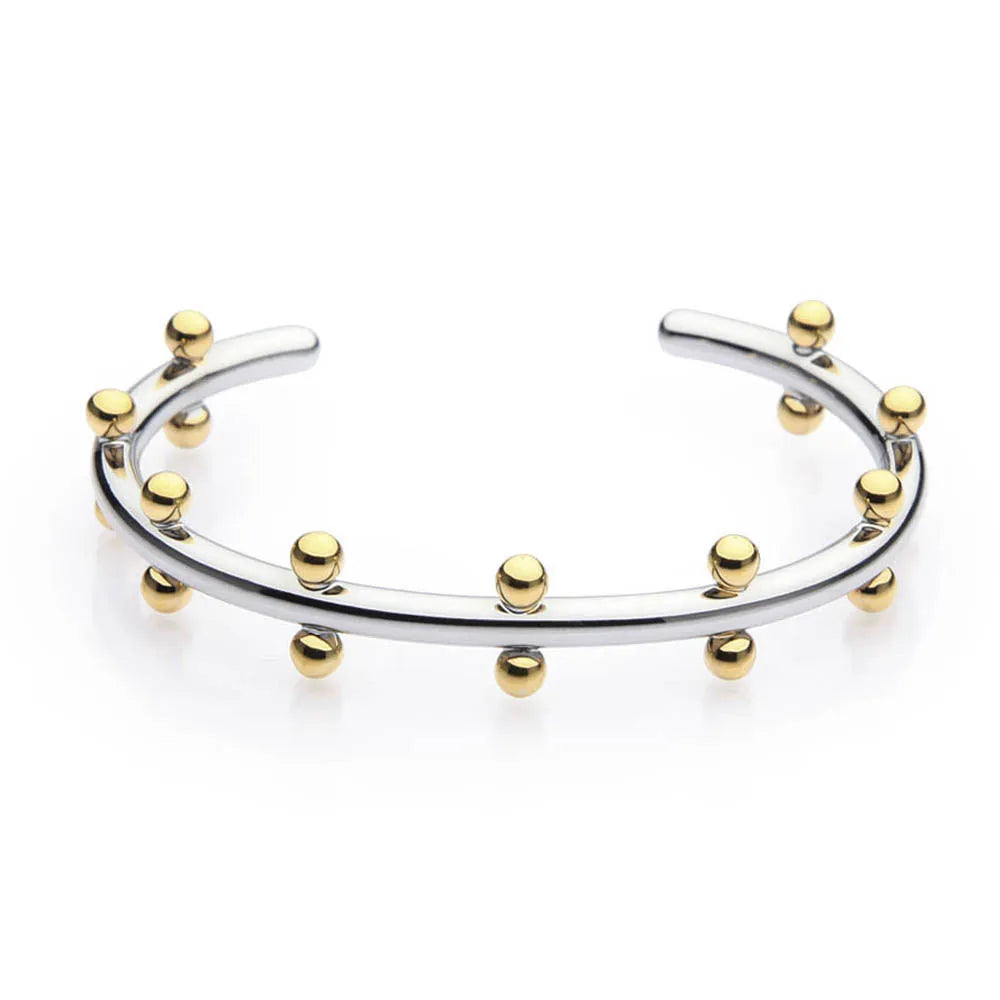 Stainless steel C-shaped bean bead with textured rivet detail in gold, silver, and two-tone finishes.