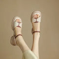 Women's khaki platform sandals with a chunky heel and open toe.