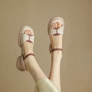 Women's khaki platform sandals with a chunky heel and open toe.