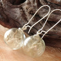 Transparent glass ball earrings with a crystal dandelion seed inside on a French hook, silver and bronze finishes shown.