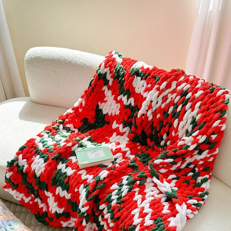 Thick striped chenille handmade blanket in a choice of four colours, shown on a double bed.