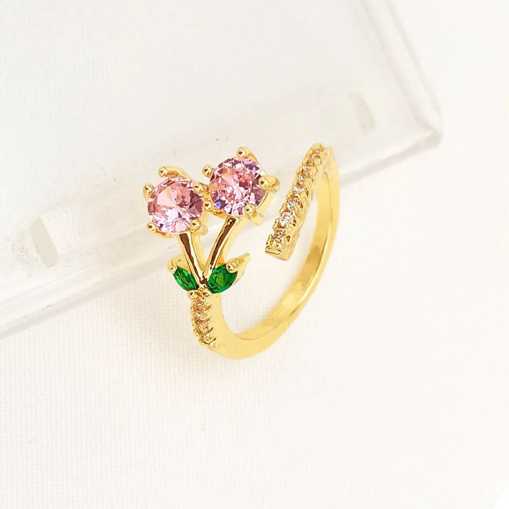 Copper geometric open ring with detailed leaf pattern and gold zircon accents