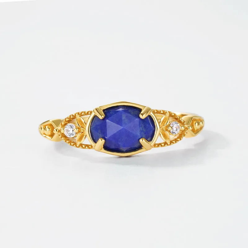 Geometric silver alloy ring with oval lapis lazuli stone in deep blue colour