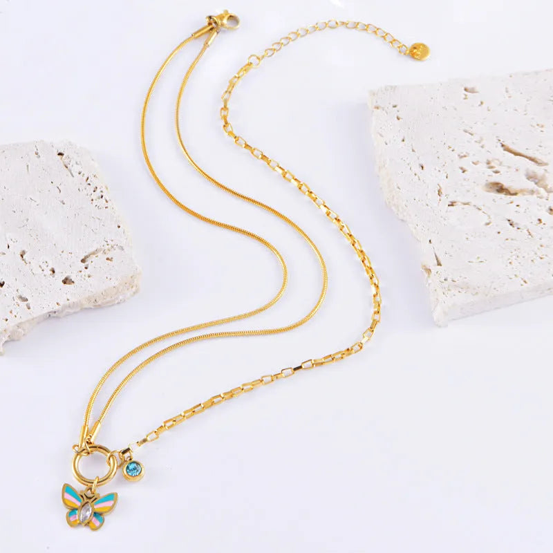 Gold butterfly jewellery set with titanium steel necklace and bracelet featuring animal zodiac design