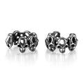 Stainless steel skull ear clip earrings with geometric hollow design and metallic finish
