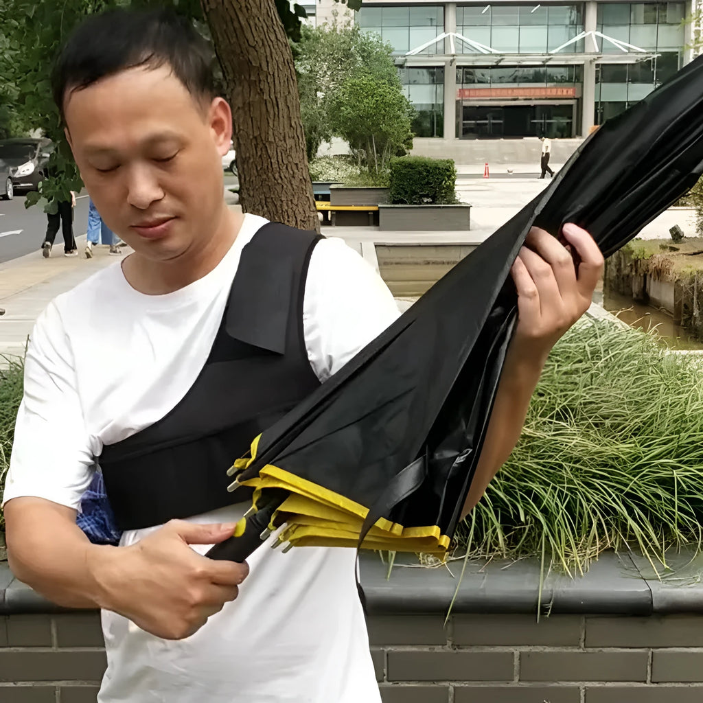 Black diving cloth umbrella holder with shoulder strap shown holding a manual umbrella