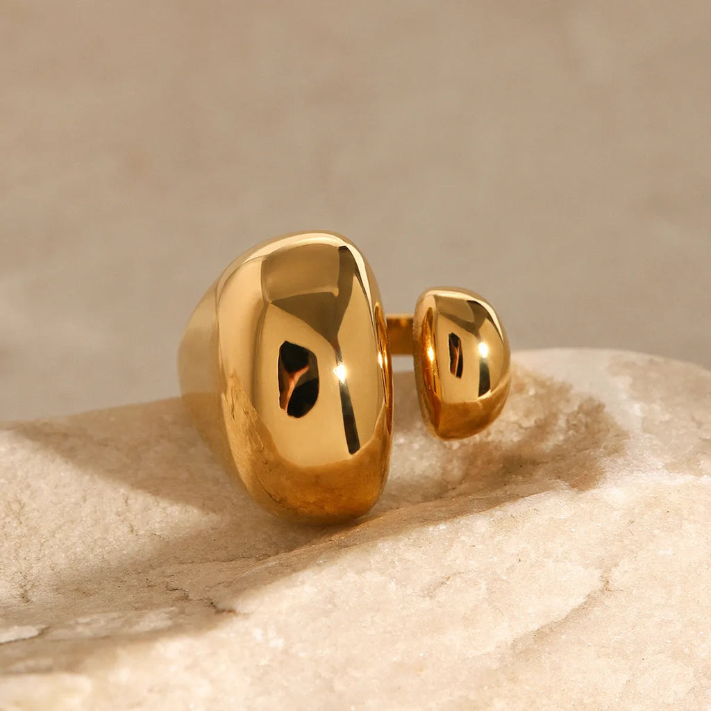 Women's exaggerated open geometric ring in stainless steel with electroplated finish.