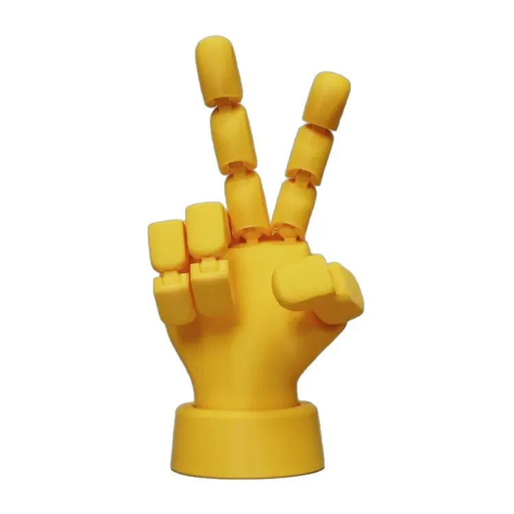 Yellow PLA plastic movable joint hand prop ornament with articulated fingers.