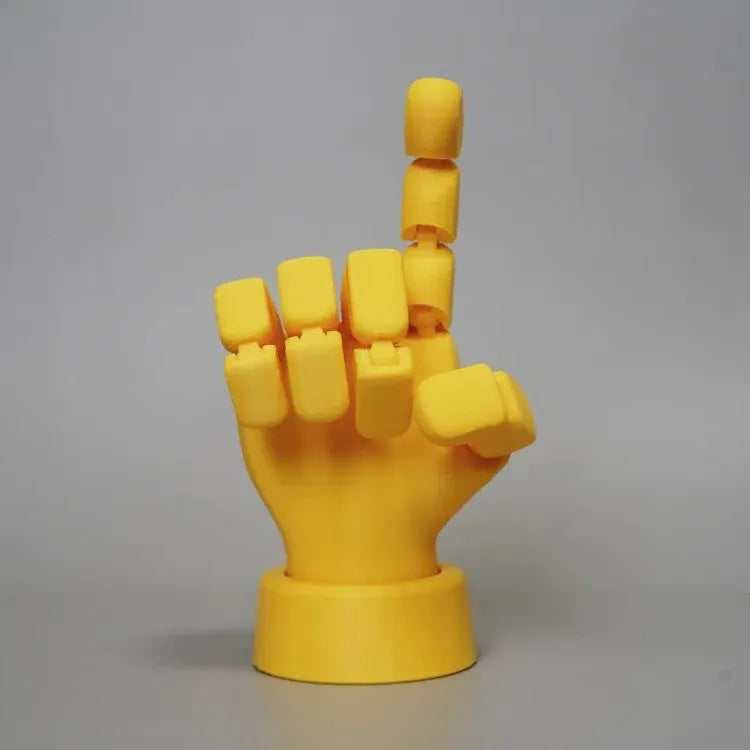 Yellow PLA plastic movable joint hand prop ornament with articulated fingers.