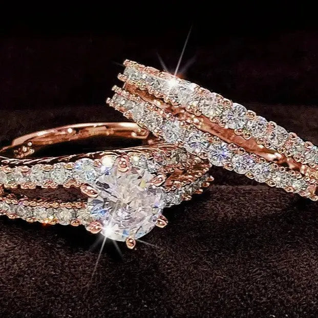 Women's 2-in-1 fully jewelled ring set in geometric design with round elements, shown in gold, rose gold, and silver finishes