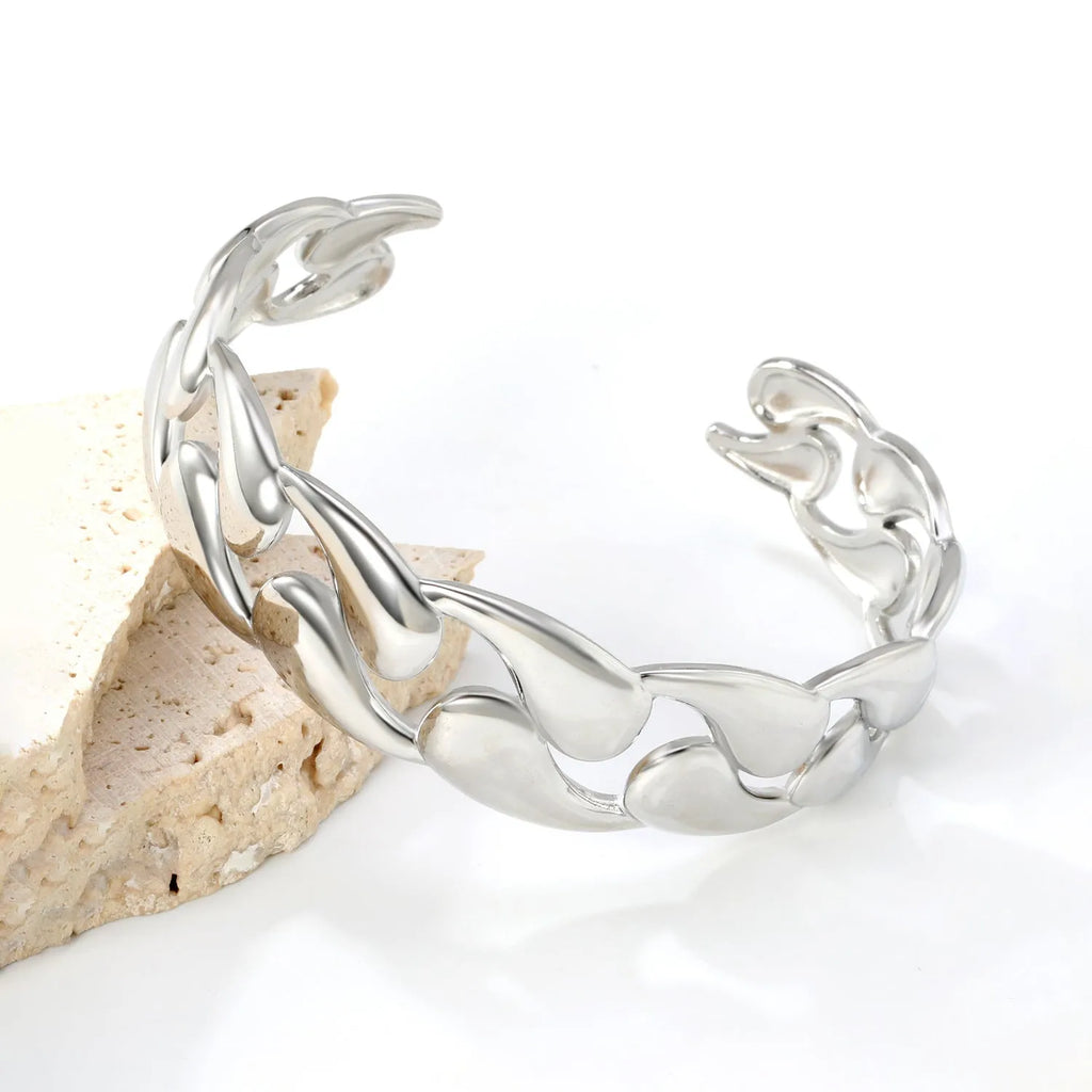 Stainless steel alloy bracelet in gold, rose gold, and silver tone colour options.