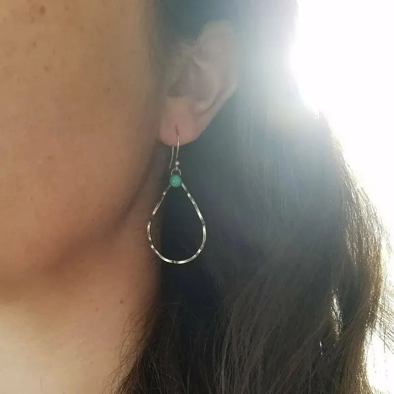 Vintage bohemian geometric circle earrings with turquoise detail in antique silver.