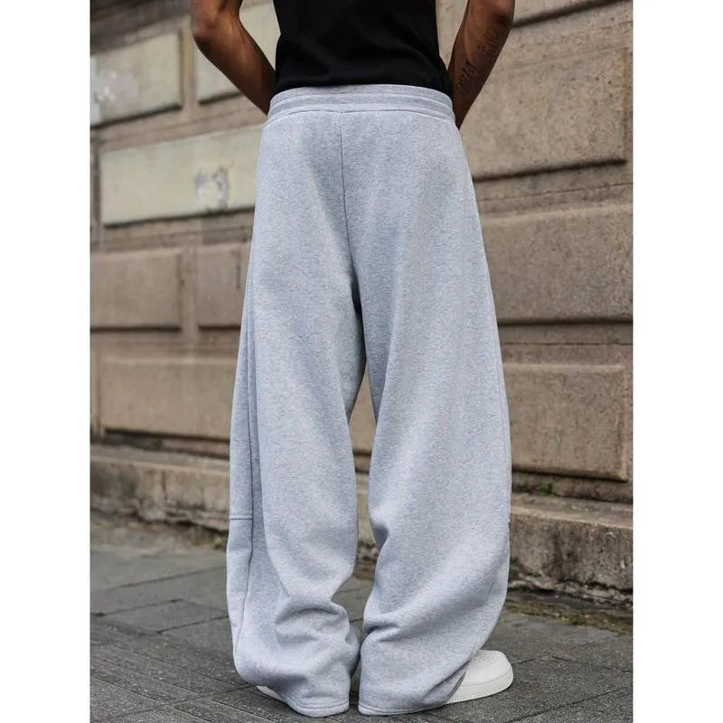 Men's straight-leg high waist casual trousers in a cropped length, shown in a dark grey colour.