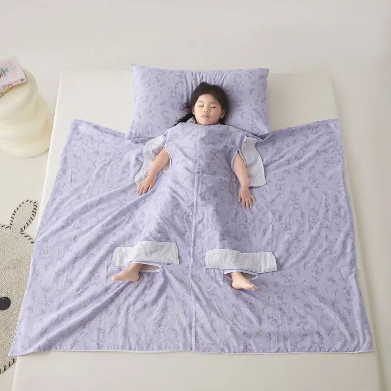 Anti-kick sleeping bag blanket in a colourful Cloud Bear Star Dream design on a bed.