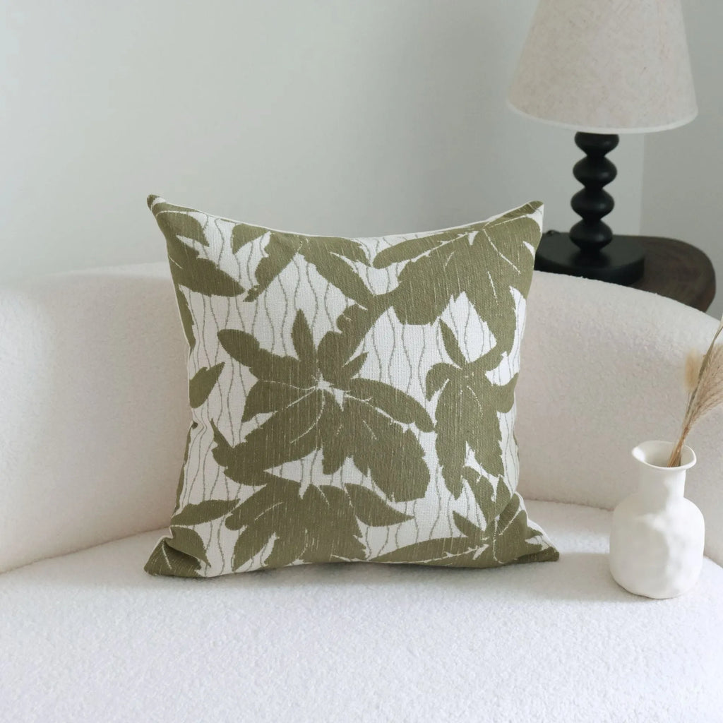 Green cotton linen hotel sample pillow with tassel detail in striped or leaf patterns