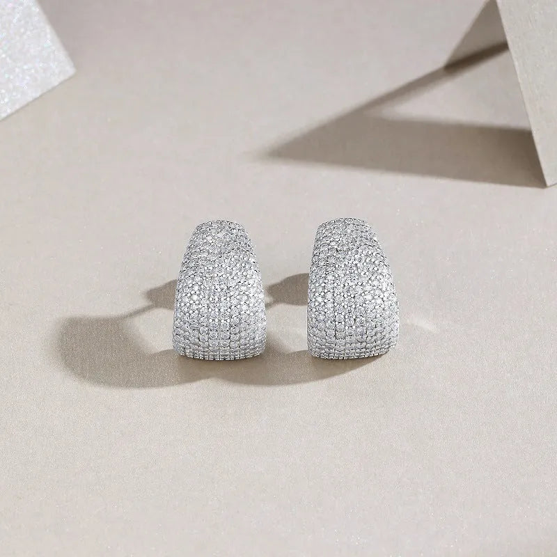 Geometric shaped S925 sterling silver stud earrings with moissanite stones.