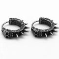 Geometric black motorcycle earrings with copper plastic punk detailing on alloy backing
