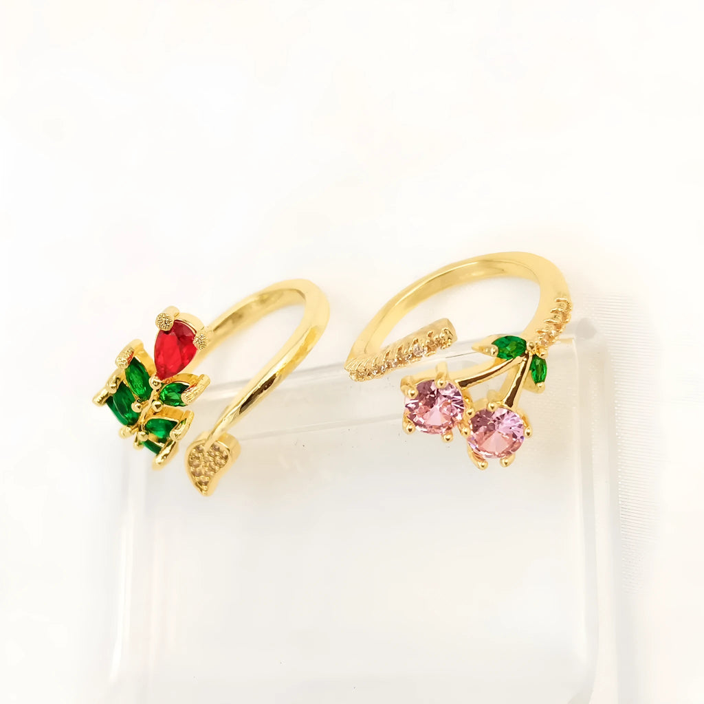 Copper geometric open ring with detailed leaf pattern and gold zircon accents
