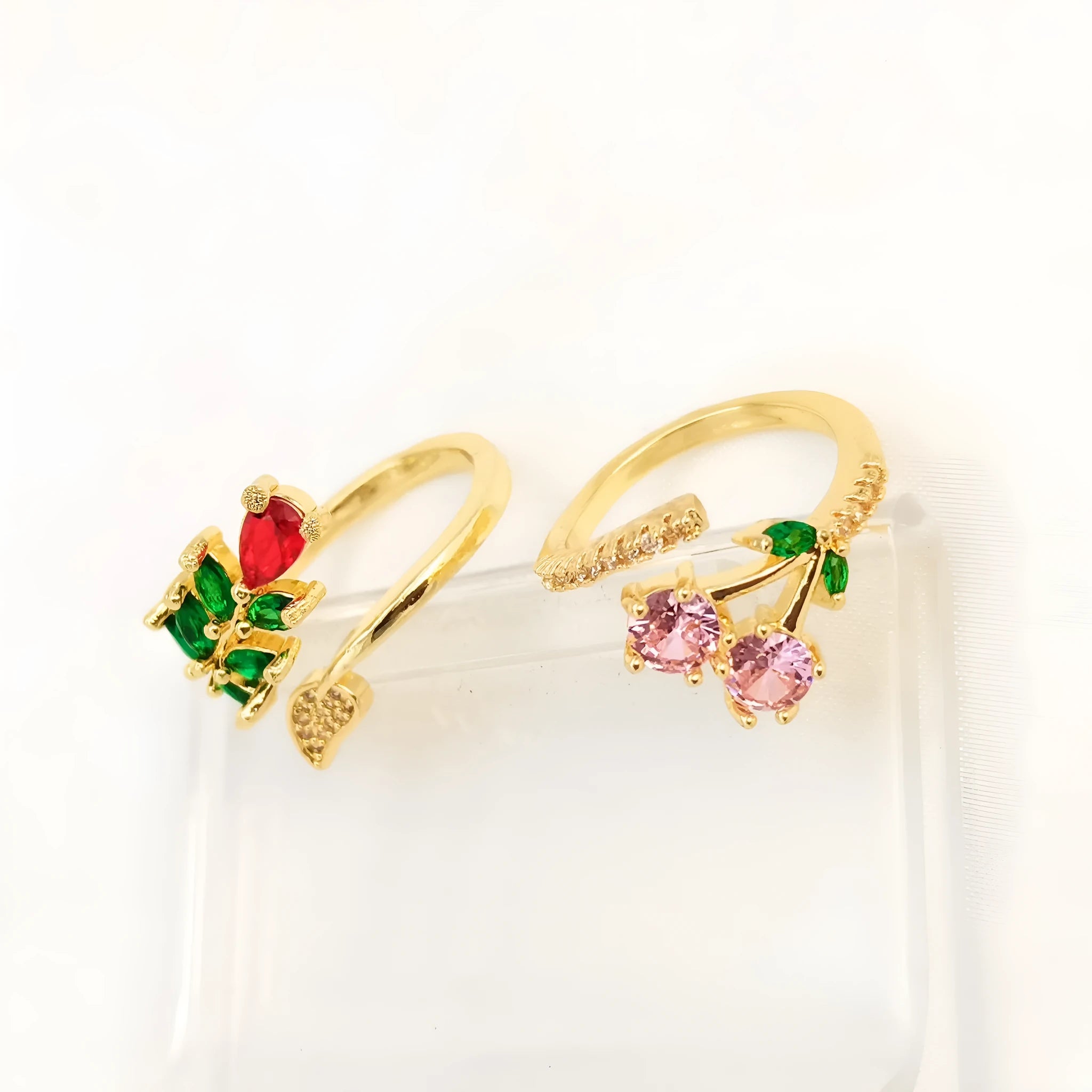 Copper geometric open ring with detailed leaf pattern and gold zircon accents