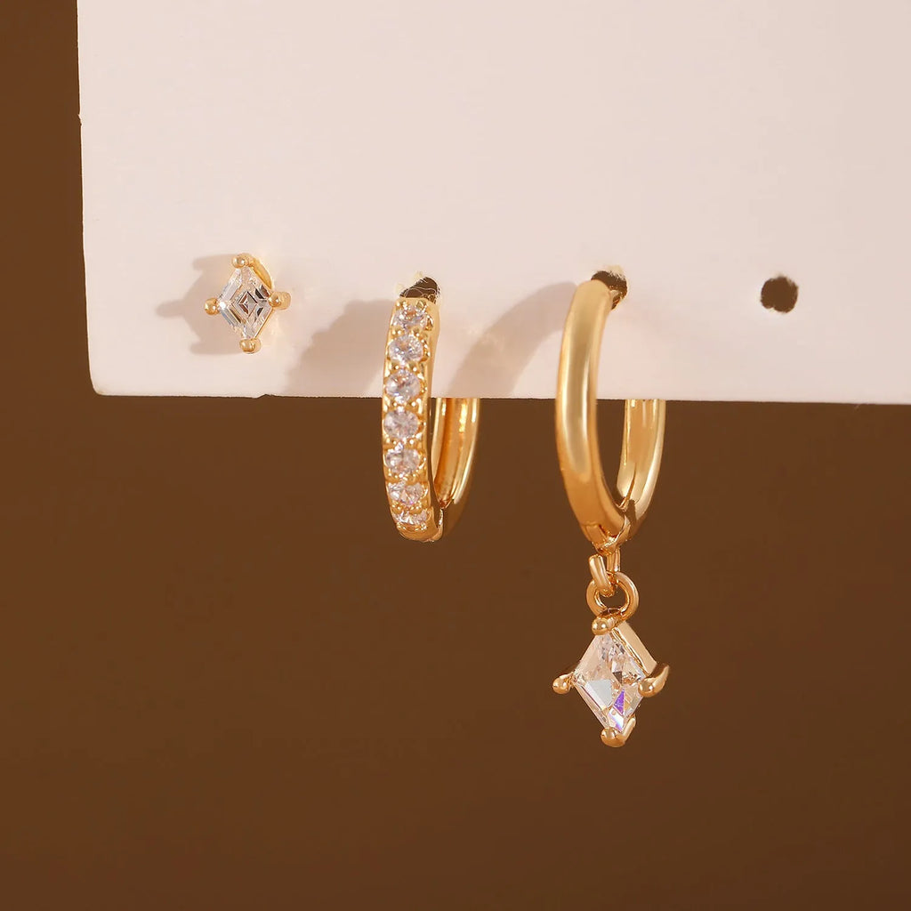 Geometric triangle and rhombus zircon earrings in gold and silver with stud, pendant, and clip styles