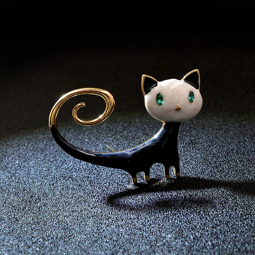 Personalised painted tailing up kitty brooch in alloy with cat motif, showing white and orange colour options