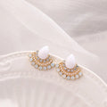 Women's silver geometric fan-shaped drop earrings with a central opal rhinestone.