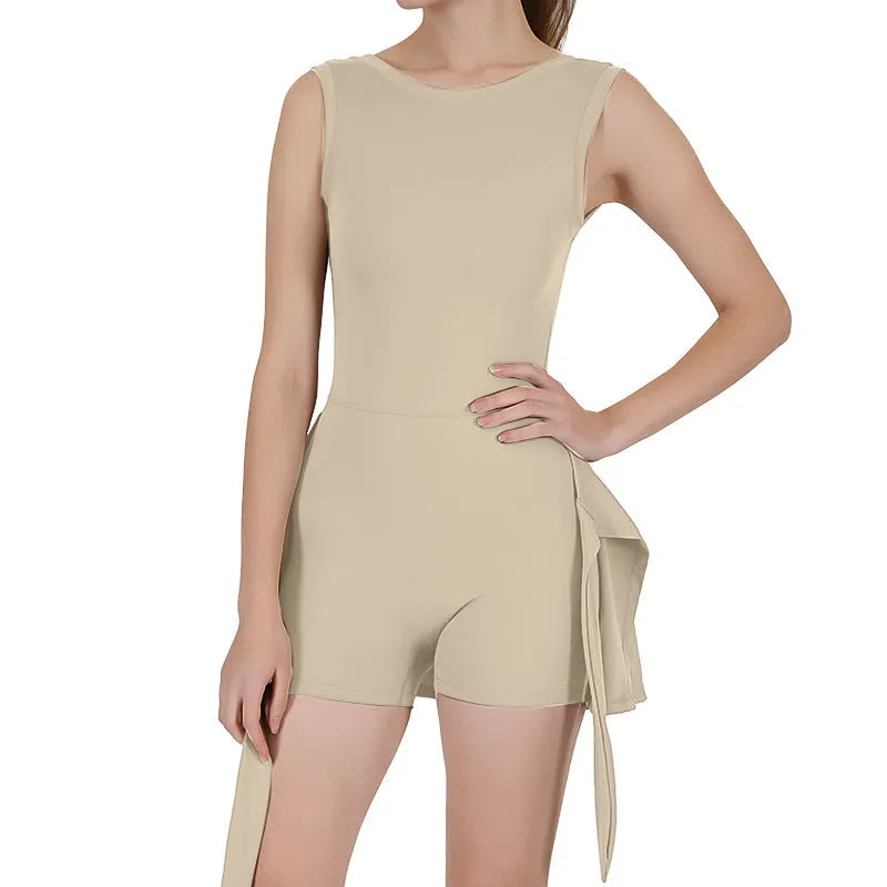 Women's solid colour tennis skirt with shaping back and built-in shorts for sports.