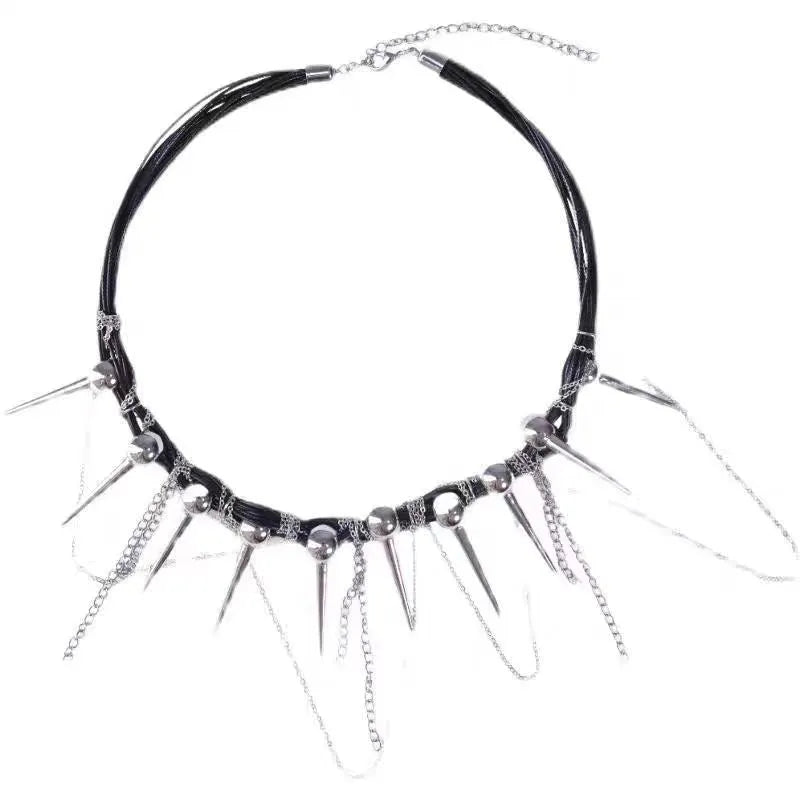 Close-up of a women's casual necklace with leather cord, electroplated round beads, and point rivets in a winding tassel design.