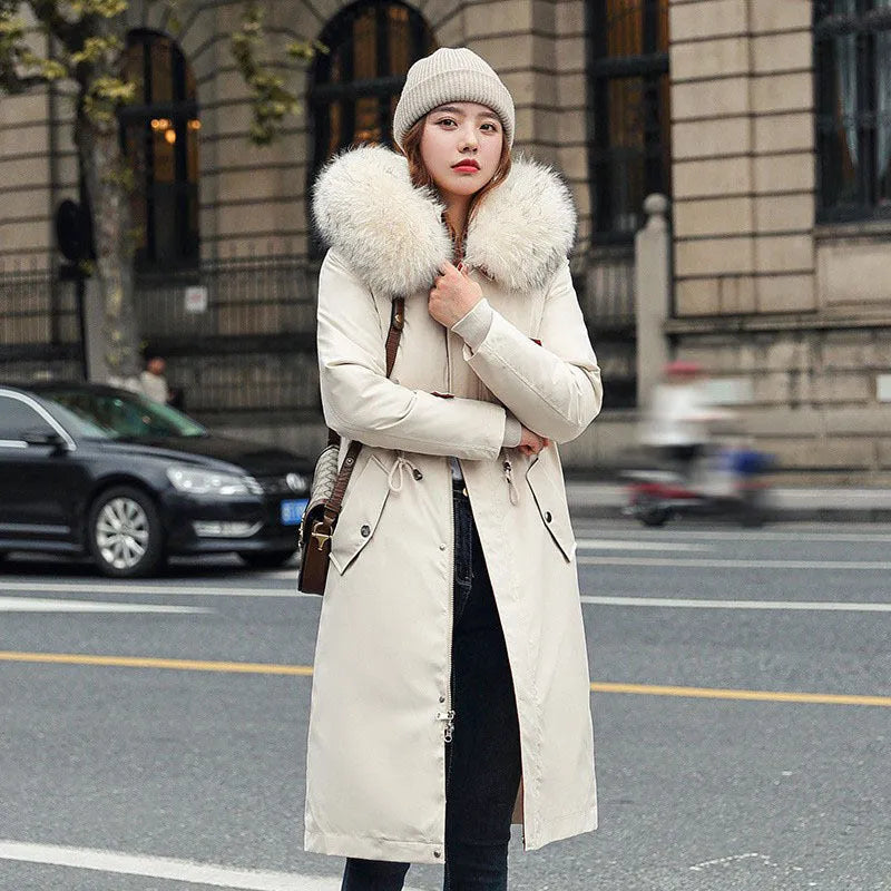 Women's long white cotton-padded fleece trench coat with down cotton filler, shown in elegant style.